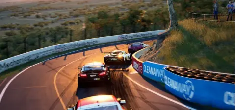 Cars racing around a curve